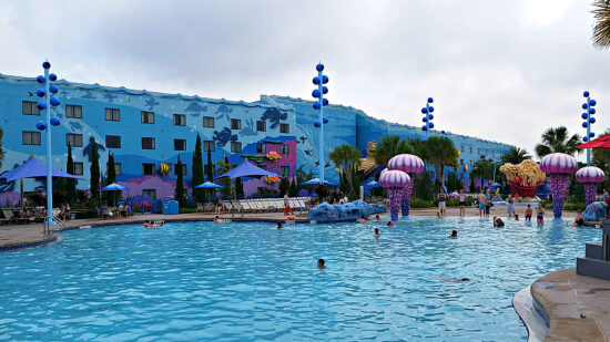 One of the best Disney World pools is at the Art of Animation resort where you can Dive "under the sea" and listen to underwater musi