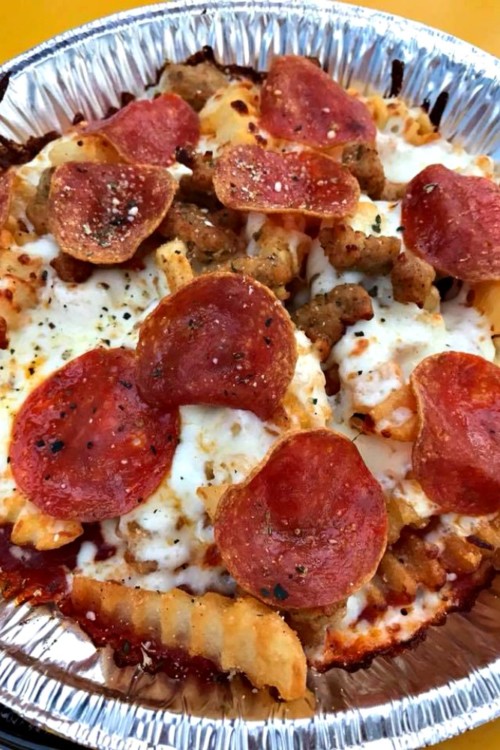 A must-try dish at Universal's Halloween Horror Nights is zesty pizza fries. 
