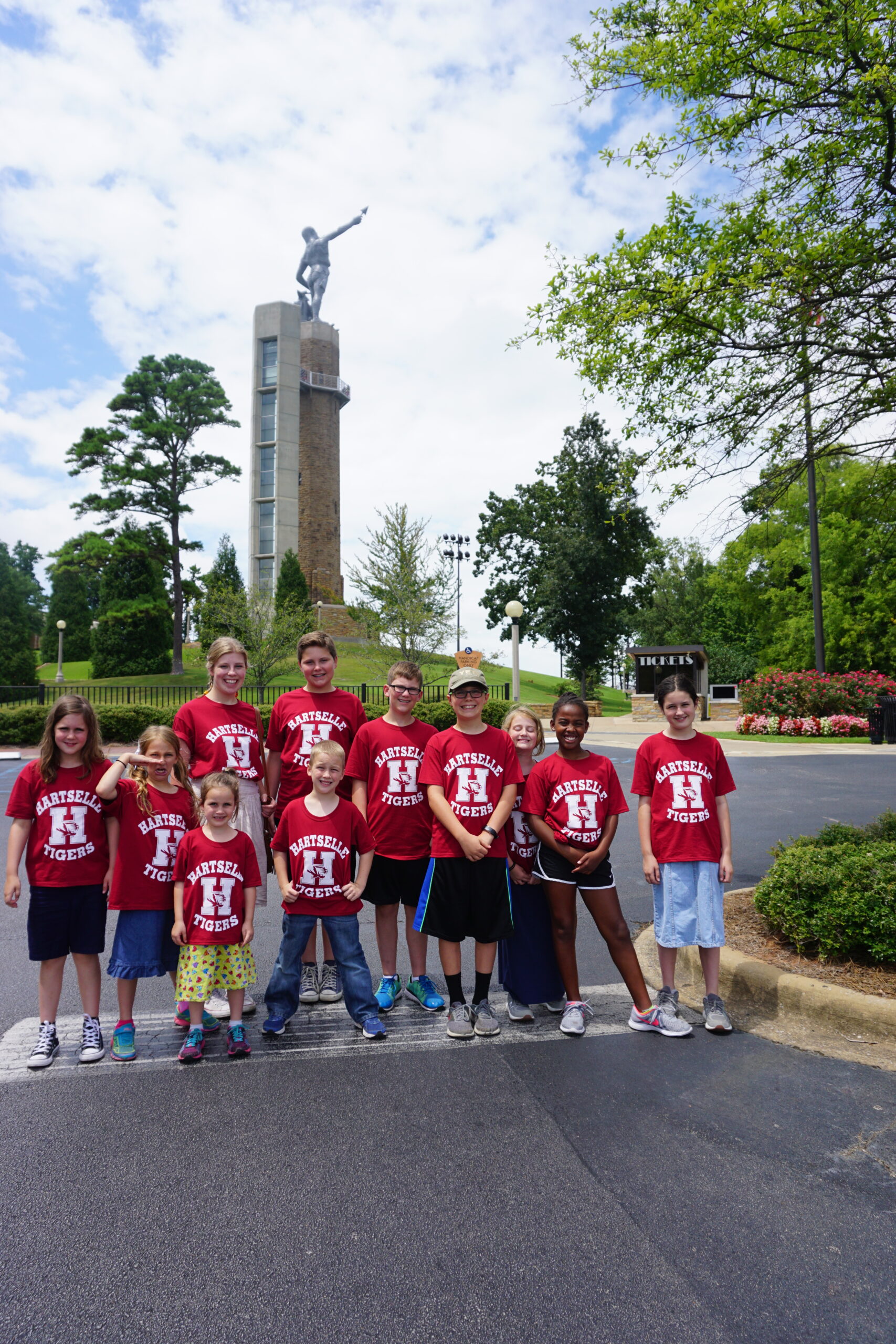 Photo of cousins at the Vulcan in Birmingham all wearing red shirts at cousin camp.