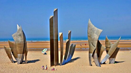 Dramatic Les Braves Sculpture on Omaha Beach, Normandy