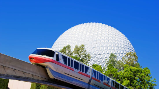spaceship earth with the monorail going in front of it