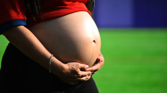 Woman's pregnant belly