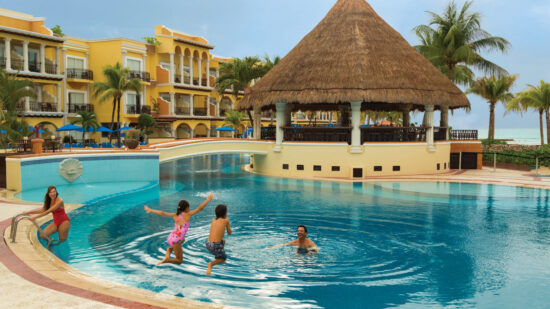 Children splashing in pool area at Panama Jack Resort, a family friendly all inclusive resort