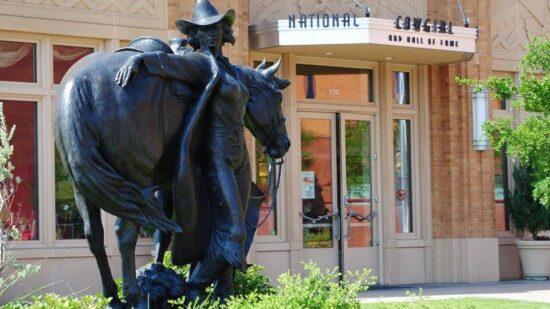 The statue of a cowgirl outside the National Cowgirl Museum and Hall of Fame in Fort Worth Texas