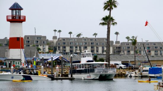 View of lighthouse, marina and downtown Oceanside CA