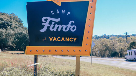 Retro Camp Fimfo sign at road entrance